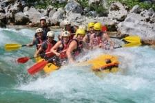 Caught in action rafting in Slovenia on Soca river.