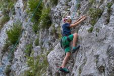 Kids rock climbing near Trigla national Park