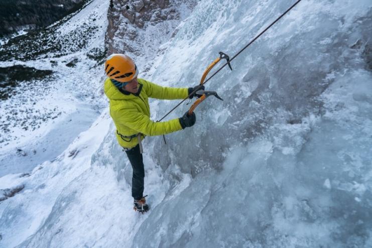 Ice climbing on top rope in Julian Alps