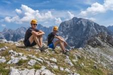 Sitting on top of mount Mojstrovka in Slovenia