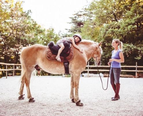 Little Girl Taking Horse Riding Lessons in Slovenia